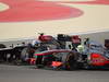 GP BAHRAIN, 21.04.2013- Gara, Romain Grosjean (FRA) Lotus F1 Team E21 e Sergio Perez (MEX) McLaren MP4-28 