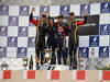GP BAHRAIN, 21.04.2013- Gara, secondo Kimi Raikkonen (FIN) Lotus F1 Team E21, Sebastian Vettel (GER) Red Bull Racing RB9 vincitore e terzo Romain Grosjean (FRA) Lotus F1 Team E21 