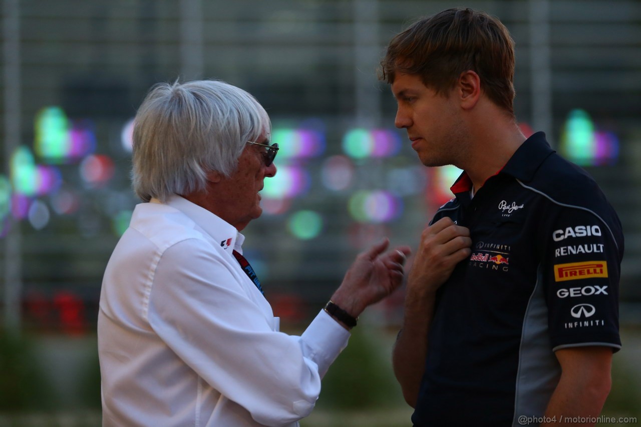 GP BAHRAIN, 20.04.2012- Bernie Ecclestone (GBR), President e CEO of Formula One Management  e Sebastian Vettel (GER) Red Bull Racing RB9 