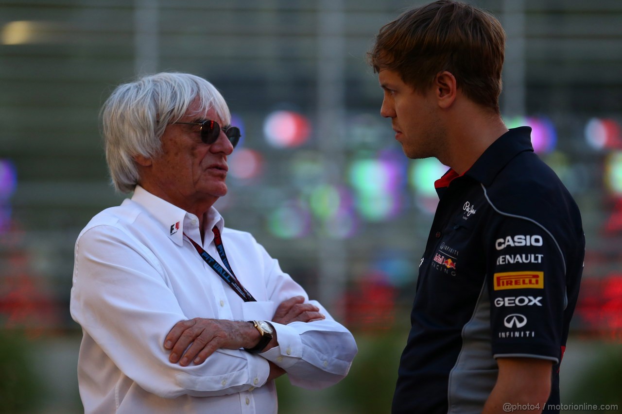 GP BAHRAIN, 20.04.2012- Bernie Ecclestone (GBR), President e CEO of Formula One Management  e Sebastian Vettel (GER) Red Bull Racing RB9