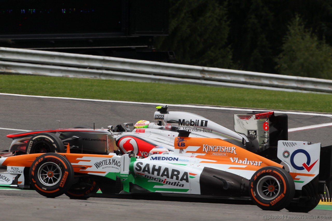 GP BELGIO, 25.08.2013-  Gara, Sergio Perez (MEX) McLaren MP4-28 e Paul di Resta (GBR) Sahara Force India F1 Team VJM06 