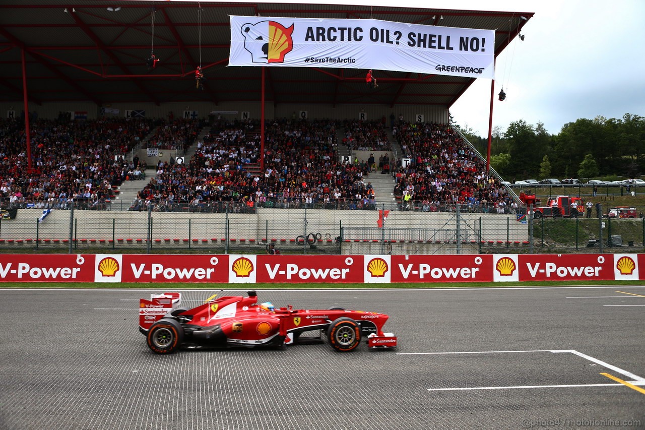 GP BELGIO, 25.08.2013-  Gara, Greenpeace make a protest against race title sponsors Shell at the grand stant, Fernando Alonso (ESP) Ferrari F138 