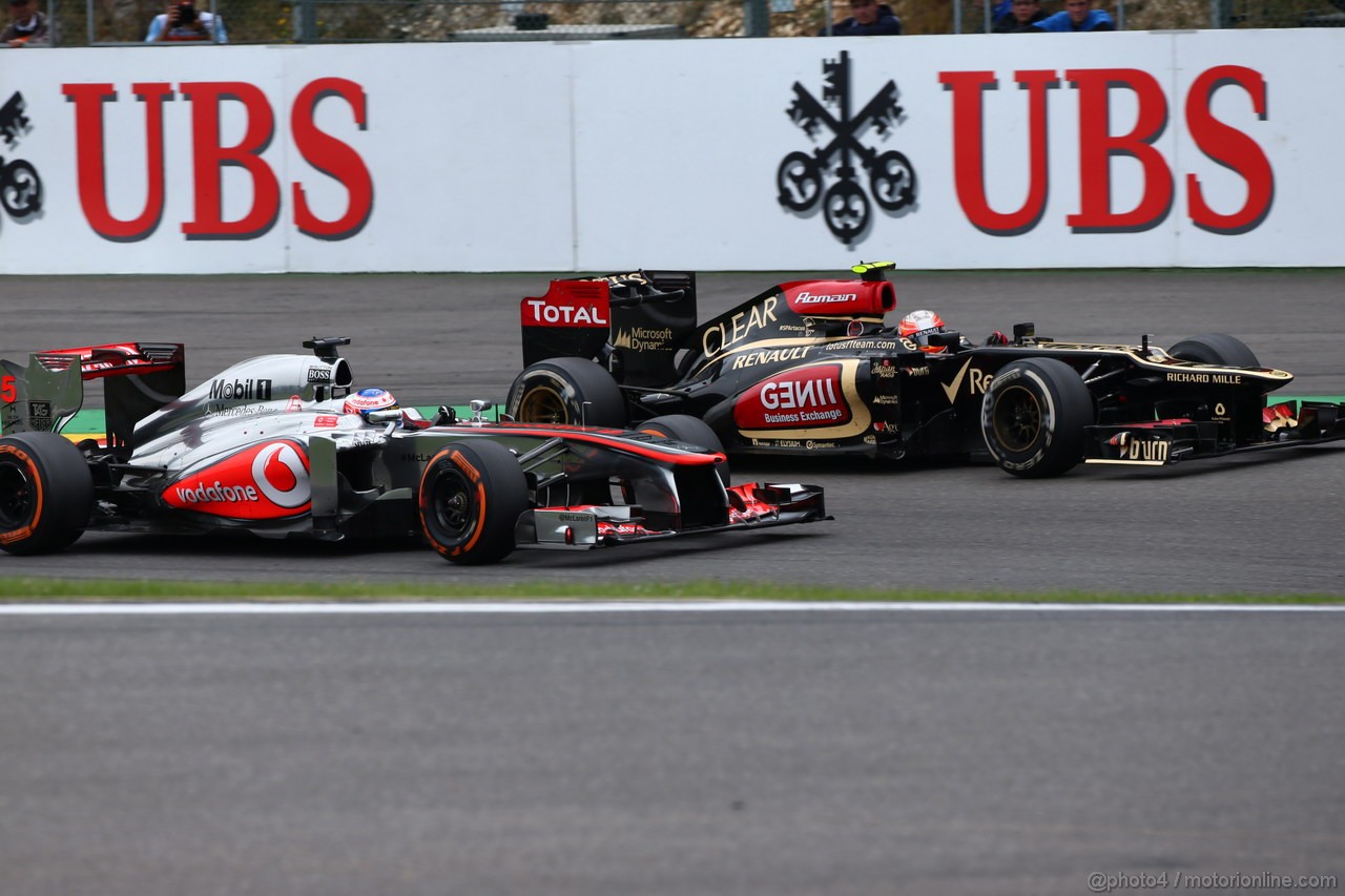 GP BELGIO, 25.08.2013-  Gara, Jenson Button (GBR) McLaren Mercedes MP4-28 e Romain Grosjean (FRA) Lotus F1 Team E21 