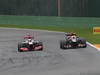 GP BELGIO, 25.08.2013-  Gara, Jenson Button (GBR) McLaren Mercedes MP4-28 e Romain Grosjean (FRA) Lotus F1 Team E21 