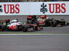 GP BELGIO, 25.08.2013-  Gara, Jenson Button (GBR) McLaren Mercedes MP4-28 e Romain Grosjean (FRA) Lotus F1 Team E21 