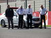 GP BELGIO, 22.08.2013- Charlie Whiting (GBR) FIA Delegate has a look at the groves on the grid