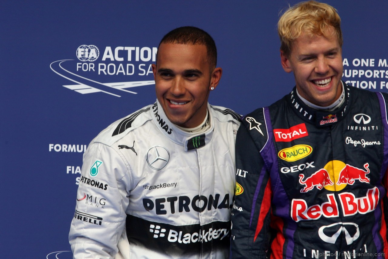 GP BELGIO, 24.08.2013- Qualifiche, Lewis Hamilton (GBR) Mercedes AMG F1 W04 pole position e Sebastian Vettel (GER) Red Bull Racing RB9 secondo 