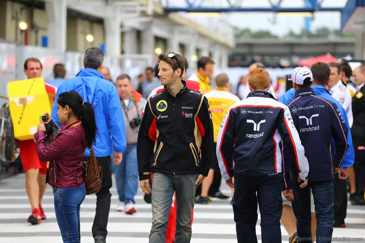 GP BRASILE, 24.11.2013 - Romain Grosjean (FRA) Lotus F1 Team E21 e Pastor Maldonado (VEN) Williams F1 Team FW35 