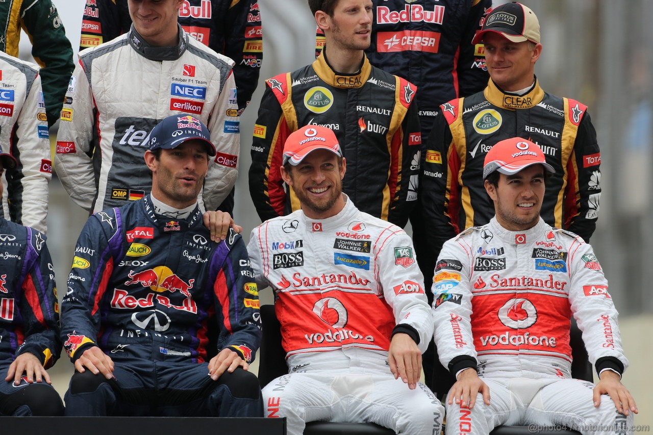 GP BRASILE, 24.11.2013 - Gara, Mark Webber (AUS) Red Bull Racing RB9 e Jenson Button (GBR) McLaren Mercedes MP4-28