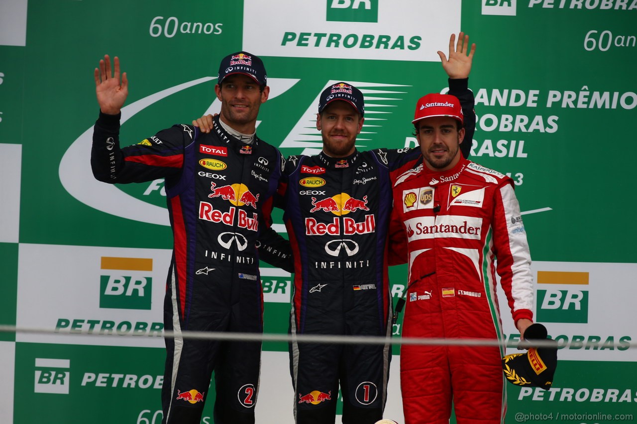 GP BRASILE, 24.11.2013 - Gara, Sebastian Vettel (GER) Red Bull Racing RB9 vincitore, secondo Mark Webber (AUS) Red Bull Racing RB9 e terzo Fernando Alonso (ESP) Ferrari F138 