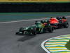 GP BRASILE, 24.11.2013 - Gara, Charles Pic (FRA) Caterham F1 Team CT03 e Jules Bianchi (FRA) Marussia F1 Team MR02 