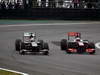 GP BRASILE, 24.11.2013 - Gara, Nico Hulkenberg (GER) Sauber F1 Team C32 e Jenson Button (GBR) McLaren Mercedes MP4-28