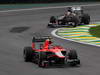 GP BRASILE, 24.11.2013 - Gara, Max Chilton (GBR), Marussia F1 Team MR02 davanti a Nico Hulkenberg (GER) Sauber F1 Team C32 