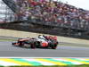 GP BRASILE, 24.11.2013 - Gara, Jenson Button (GBR) McLaren Mercedes MP4-28 e Daniel Ricciardo (AUS) Scuderia Toro Rosso STR8 