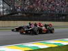 GP BRASILE, 24.11.2013 - Gara, Heikki Kovalainen (FIN) Lotus F1 Team E21  e Jean-Eric Vergne (FRA) Scuderia Toro Rosso STR8