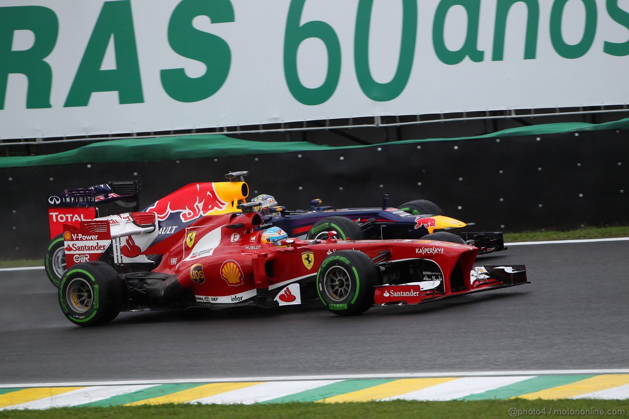 GP BRASILE, 22.11.2013- Prove Libere 1, Fernando Alonso (ESP) Ferrari F138 e Sebastian Vettel (GER) Red Bull Racing RB9
