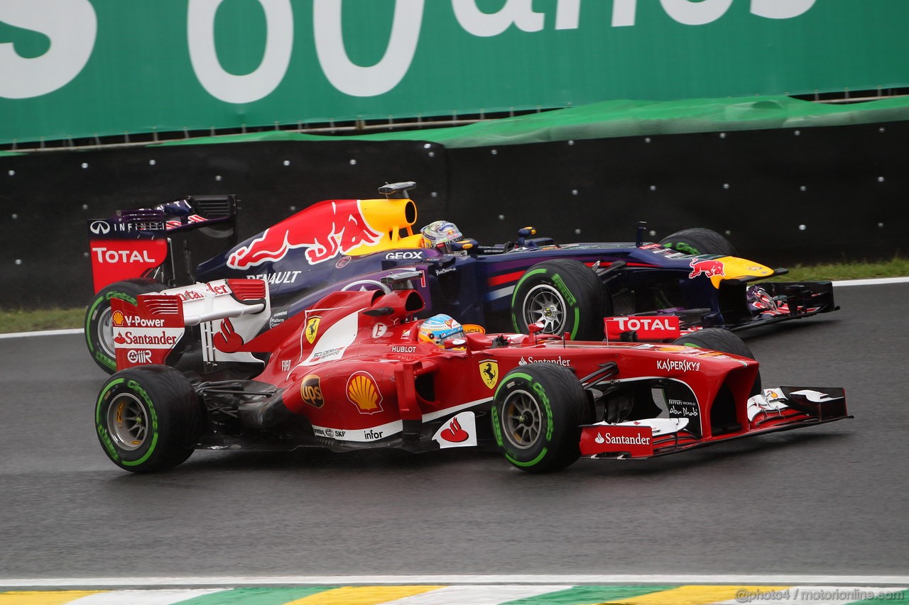 GP BRASILE, 22.11.2013- Prove Libere 1, Fernando Alonso (ESP) Ferrari F138 e Sebastian Vettel (GER) Red Bull Racing RB9 