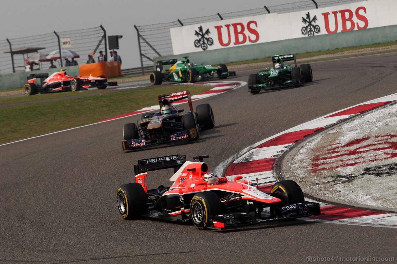 GP CINA, 14.04.2013- Gara, Jules Bianchi (FRA) Marussia F1 Team MR02 davanti a Jean-Eric Vergne (FRA) Scuderia Toro Rosso STR8 