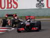 GP CINA, 14.04.2013- Gara, Jenson Button (GBR) McLaren Mercedes MP4-28 davanti a Romain Grosjean (FRA) Lotus F1 Team E21 