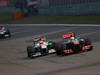 GP CINA, 14.04.2013- Gara, Adrian Sutil (GER), Sahara Force India F1 Team VJM06 e Sergio Perez (MEX) McLaren MP4-28 