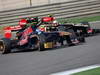 GP CINA, 14.04.2013- Gara, Daniel Ricciardo (AUS) Scuderia Toro Rosso STR8 e Romain Grosjean (FRA) Lotus F1 Team E21 