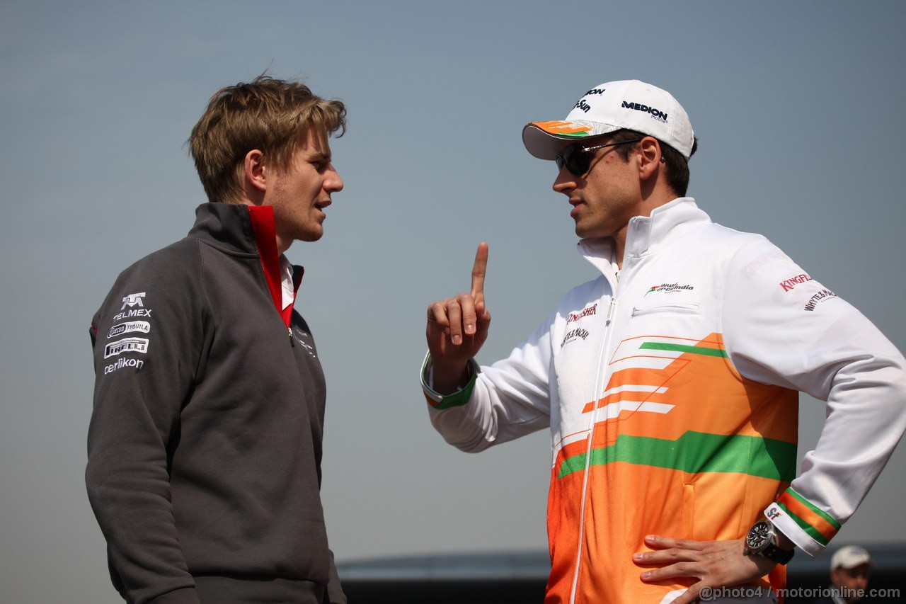 GP CINA, 11.04.2013- Nico Hulkenberg (GER) Sauber F1 Team C32 e Adrian Sutil (GER), Sahara Force India F1 Team VJM06 