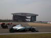 GP CINA, 12.04.2013- Free Practice 1, Kimi Raikkonen (FIN) Lotus F1 Team E21 e Lewis Hamilton (GBR) Mercedes AMG F1 W04 