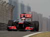 GP CINA, 12.04.2013- Free Practice 2, Jenson Button (GBR) McLaren Mercedes MP4-28 with the front tyre daneged