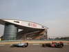 GP CINA, 12.04.2013- Free Practice 2, Nico Rosberg (GER) Mercedes AMG F1 W04 e Romain Grosjean (FRA) Lotus F1 Team E21 