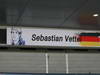 GP COREA, 03.10.2013- Sebastian Vettel (GER) Red Bull Racing RB9 banner over his garage