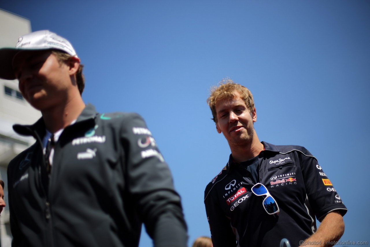 GP GERMANIA, 07.07.2013- Nico Rosberg (GER) Mercedes AMG F1 W04 e Sebastian Vettel (GER) Red Bull Racing RB9 