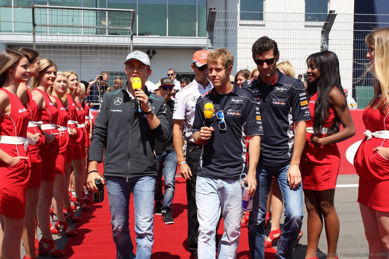 GP GERMANIA, 07.07.2013- Nico Rosberg (GER) Mercedes AMG F1 W04, Sebastian Vettel (GER) Red Bull Racing RB9 e Mark Webber (AUS) Red Bull Racing RB9 