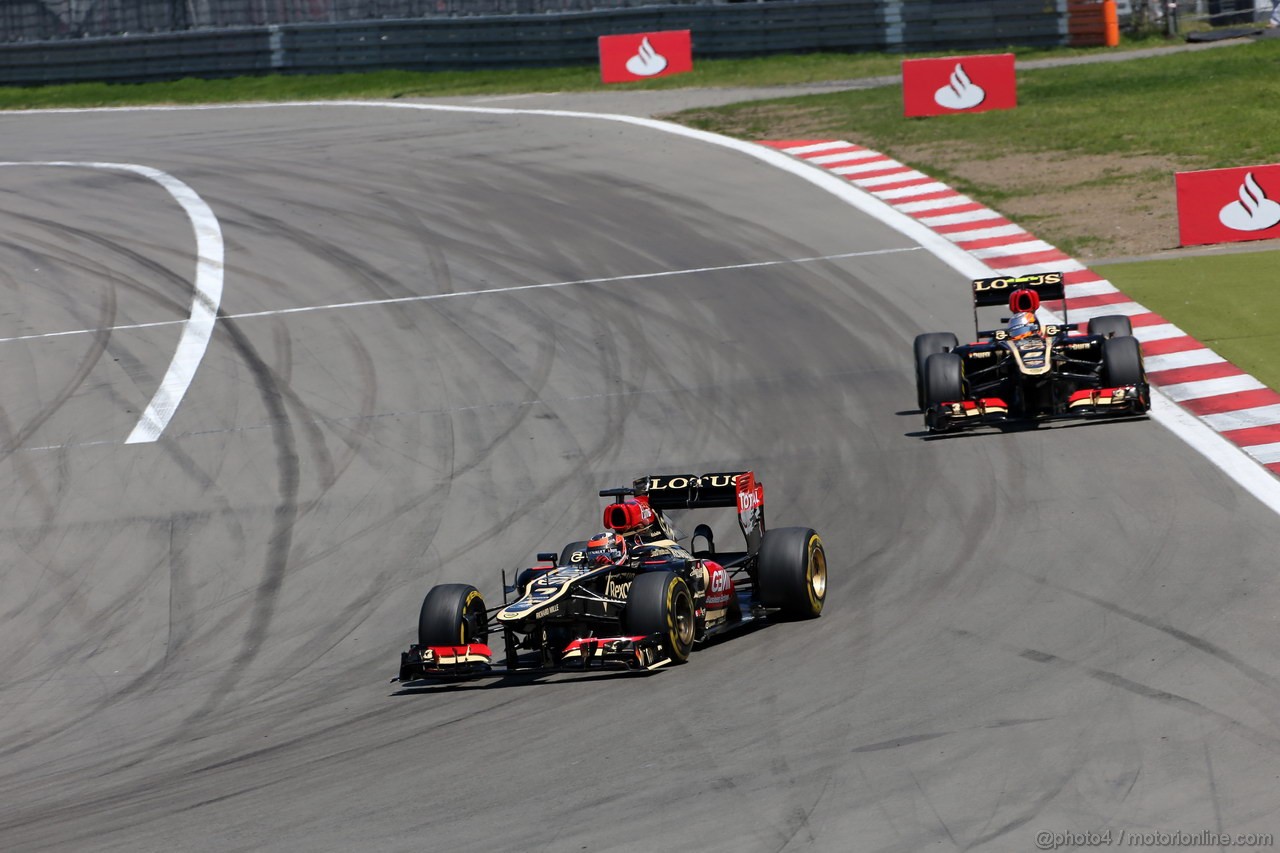 GP GERMANIA, 07.07.2013-  Gara, Kimi Raikkonen (FIN) Lotus F1 Team E21 davanti a Romain Grosjean (FRA) Lotus F1 Team E21 