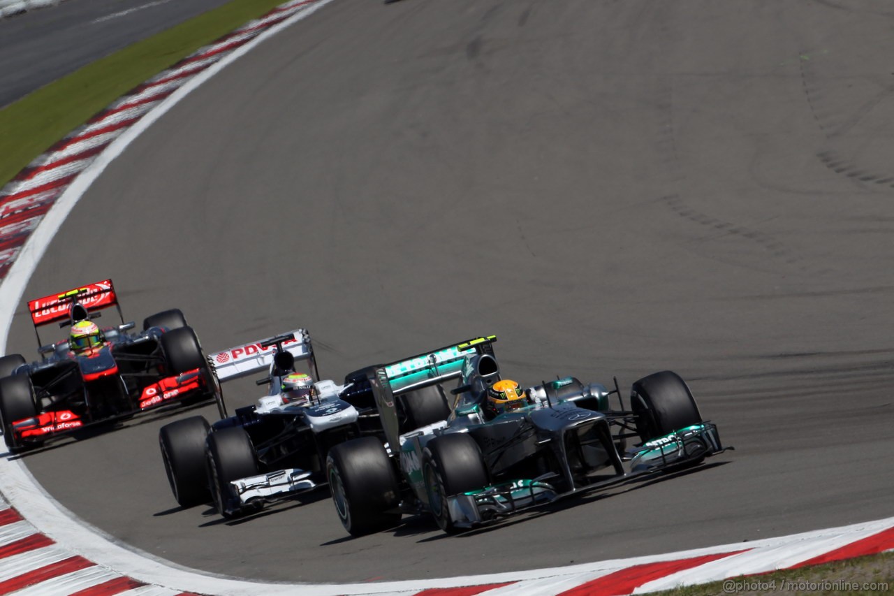 GP GERMANIA, 07.07.2013-  Gara, Lewis Hamilton (GBR) Mercedes AMG F1 W04 davanti a Pastor Maldonado (VEN) Williams F1 Team FW35 