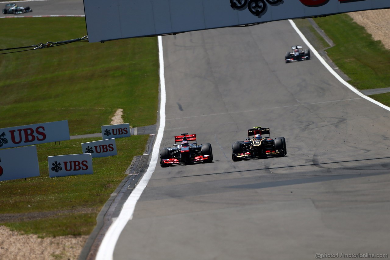 GP GERMANIA, 07.07.2013-  Gara, Jenson Button (GBR) McLaren Mercedes MP4-28 e Romain Grosjean (FRA) Lotus F1 Team E21