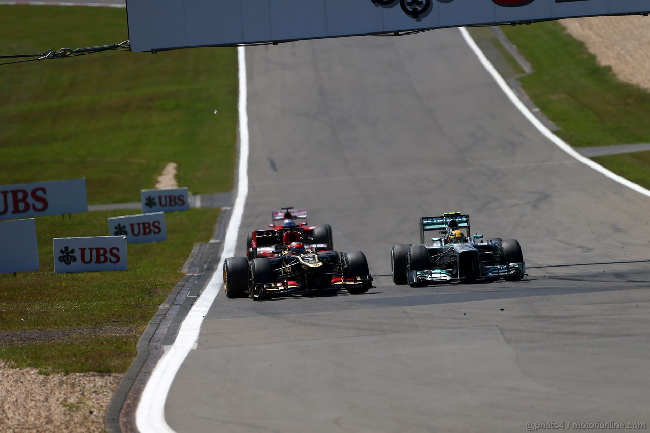 GP GERMANIA, 07.07.2013-  Gara, Kimi Raikkonen (FIN) Lotus F1 Team E21 e Lewis Hamilton (GBR) Mercedes AMG F1 W04