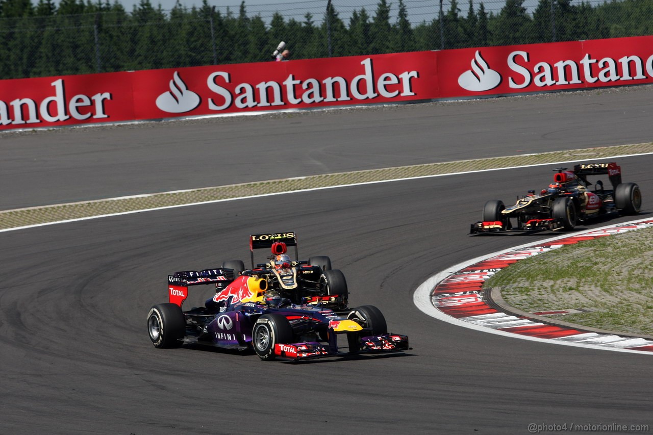 GP GERMANIA, 07.07.2013-  Gara, Sebastian Vettel (GER) Red Bull Racing RB9 e Romain Grosjean (FRA) Lotus F1 Team E21 