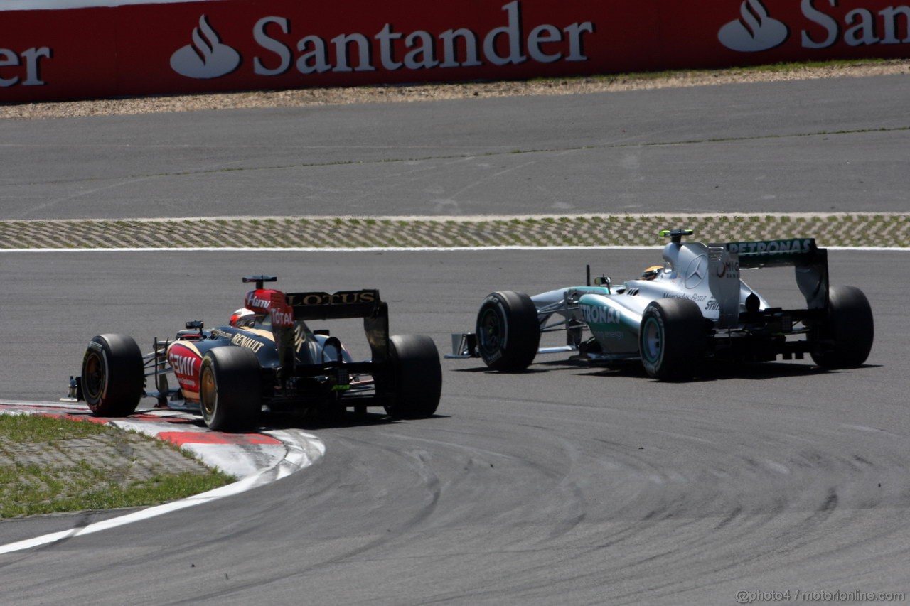 GP GERMANIA, 07.07.2013-  Gara, Kimi Raikkonen (FIN) Lotus F1 Team E21 e Lewis Hamilton (GBR) Mercedes AMG F1 W04 