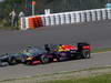 GP GERMANIA, 07.07.2013-  Gara, Sebastian Vettel (GER) Red Bull Racing RB9 pass Lewis Hamilton (GBR) Mercedes AMG F1 W04