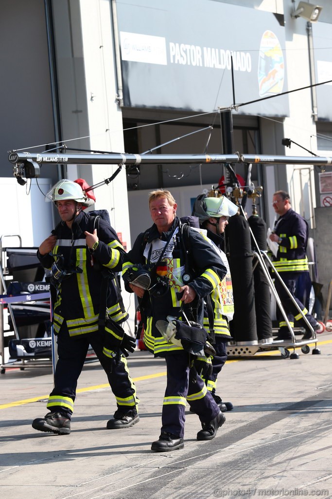 GP GERMANIA, 06.07.2013- Firemen were called to the Williams garage after they suffered a KERS fire.