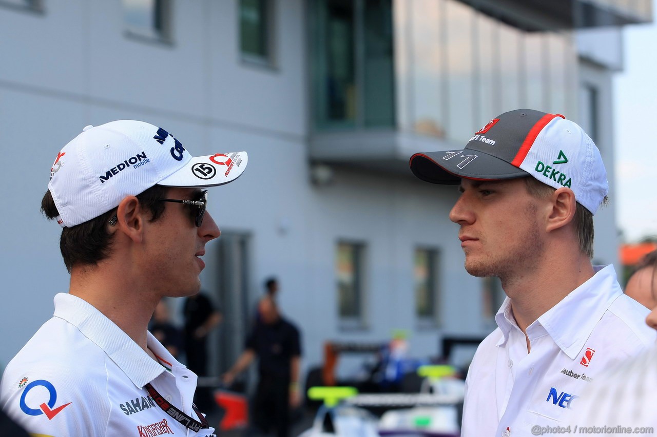 GP GERMANIA, 06.07.2013- Adrian Sutil (GER), Sahara Force India F1 Team VJM06 e Nico Hulkenberg (GER) Sauber F1 Team C32 