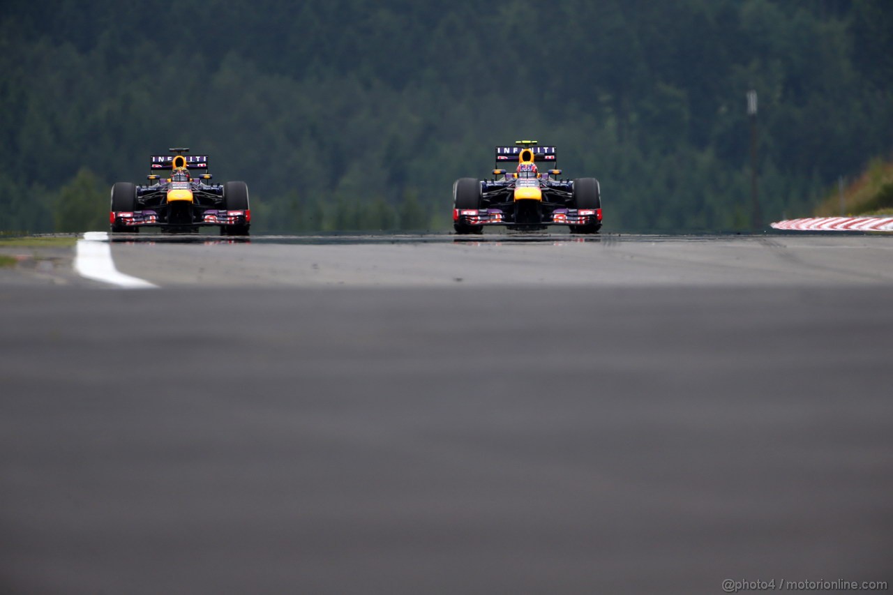 GP GERMANIA, 05.07.2013- Prove Libere 1, Sebastian Vettel (GER) Red Bull Racing RB9 e Mark Webber (AUS) Red Bull Racing RB9 