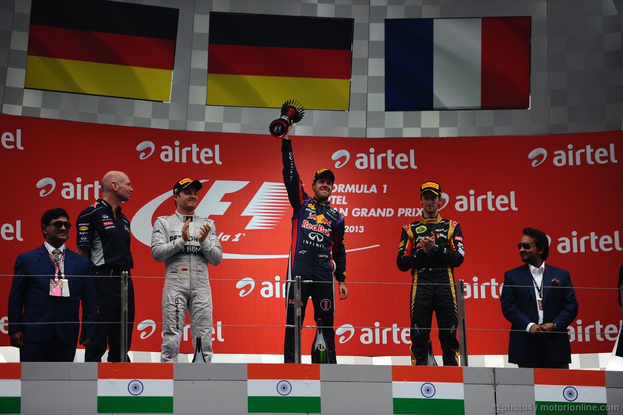 GP INDIA, 27.10.2013- Podium: Sebastian Vettel (GER) Red Bull Racing RB9 (vincitore), Nico Rosberg (GER) Mercedes AMG F1 W04 (secondo) e Romain Grosjean (FRA) Lotus F1 Team E21 (terzo)