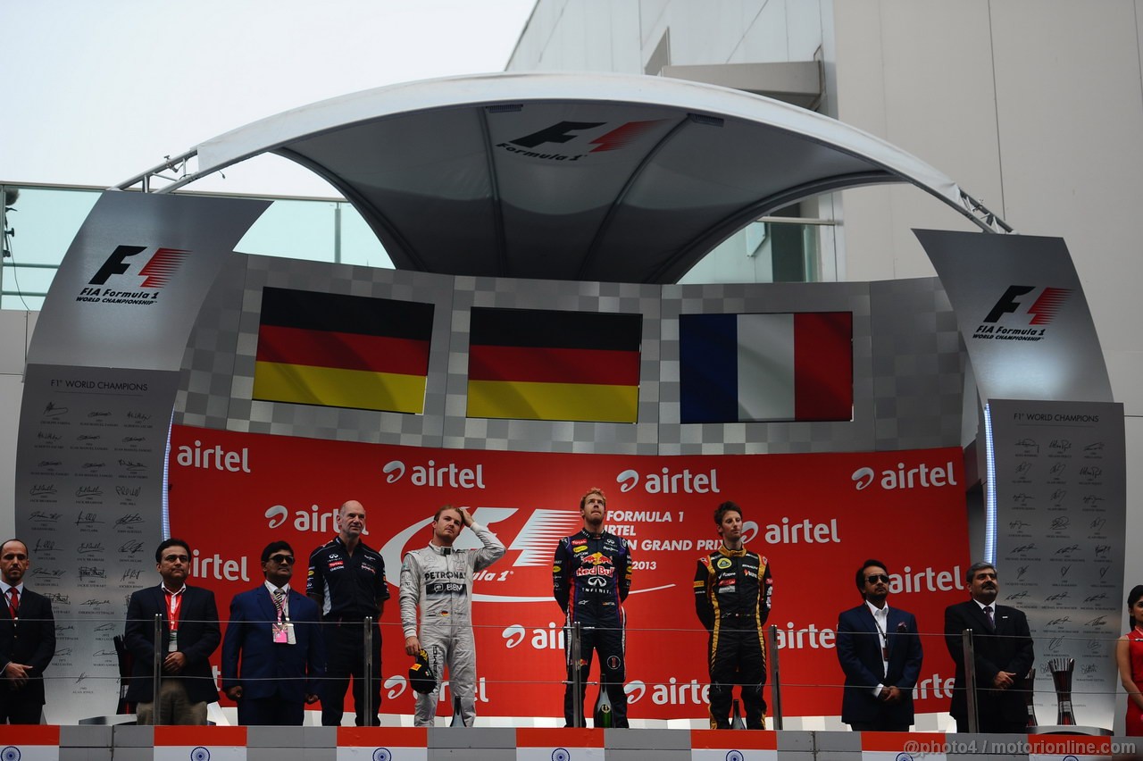 GP INDIA, 27.10.2013- Podium: Sebastian Vettel (GER) Red Bull Racing RB9 (vincitore), Nico Rosberg (GER) Mercedes AMG F1 W04 (secondo) e Romain Grosjean (FRA) Lotus F1 Team E21 (terzo)