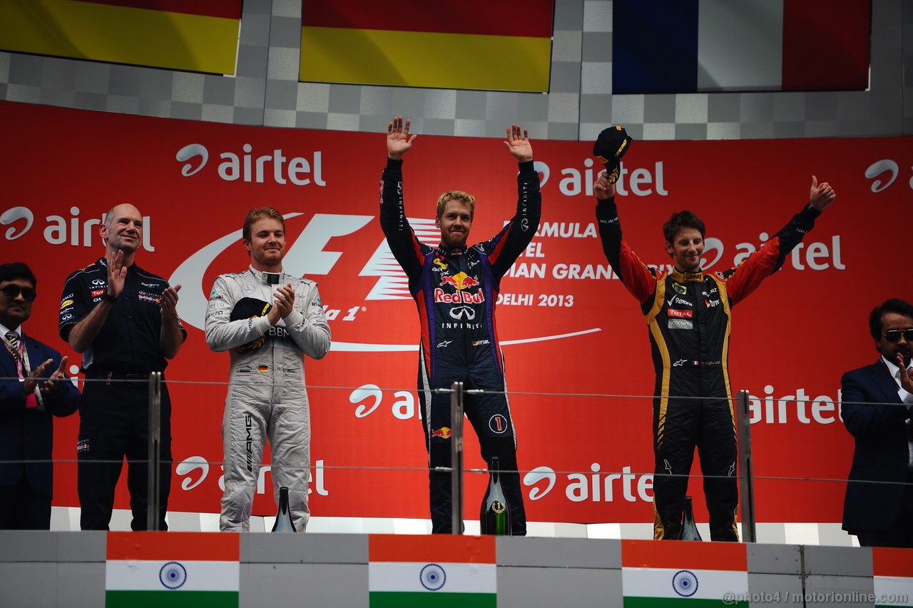 GP INDIA, 27.10.2013- Podium: Sebastian Vettel (GER) Red Bull Racing RB9 (vincitore), Nico Rosberg (GER) Mercedes AMG F1 W04 (secondo) e Romain Grosjean (FRA) Lotus F1 Team E21 (terzo)