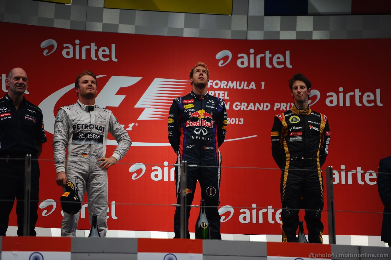 GP INDIA, 27.10.2013- Podium: Sebastian Vettel (GER) Red Bull Racing RB9 (vincitore), Nico Rosberg (GER) Mercedes AMG F1 W04 (secondo) e Romain Grosjean (FRA) Lotus F1 Team E21 (terzo)