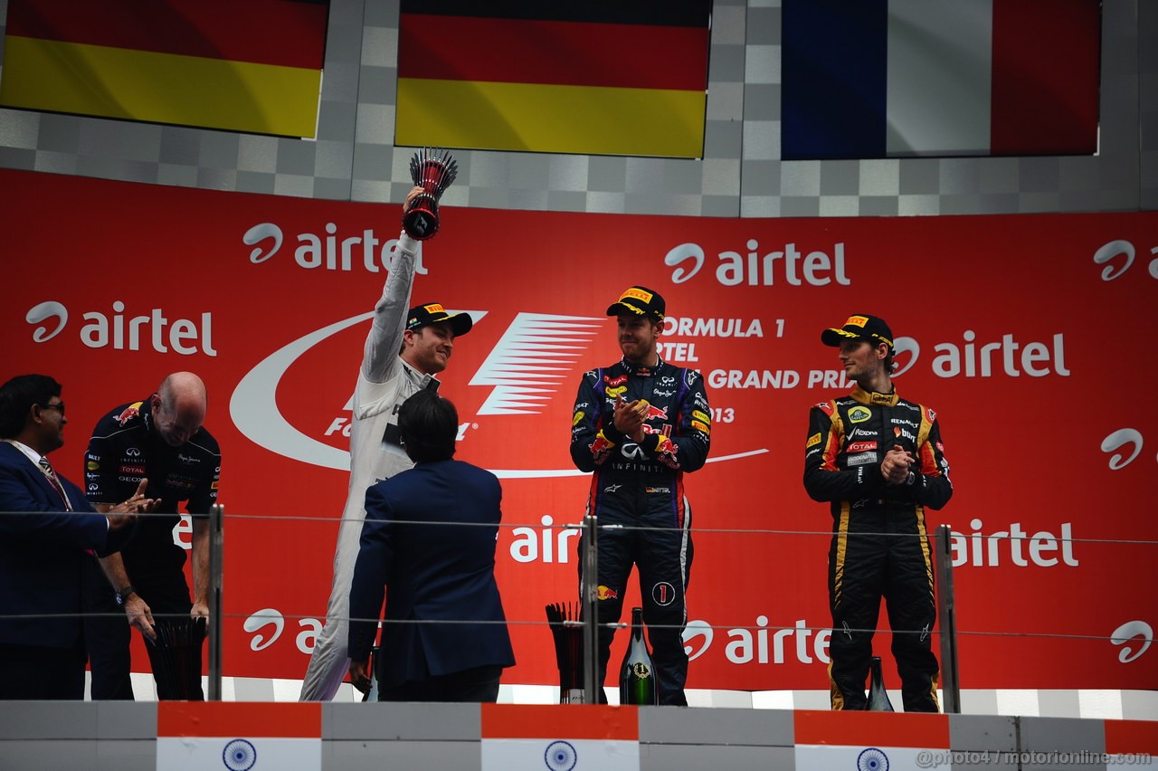 GP INDIA, 27.10.2013- Podium: Sebastian Vettel (GER) Red Bull Racing RB9 (vincitore), Nico Rosberg (GER) Mercedes AMG F1 W04 (secondo) e Romain Grosjean (FRA) Lotus F1 Team E21 (terzo)