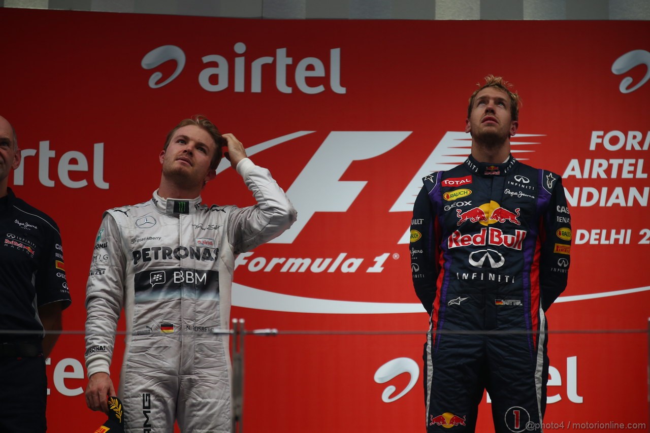 GP INDIA, 27.10.2013- Podium: Sebastian Vettel (GER) Red Bull Racing RB9 (vincitore), Nico Rosberg (GER) Mercedes AMG F1 W04 (secondo) e Romain Grosjean (FRA) Lotus F1 Team E21 (terzo) 