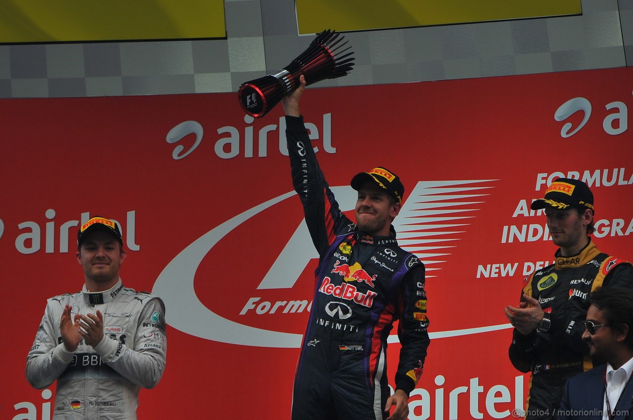 GP INDIA, 27.10.2013- Podium: Sebastian Vettel (GER) Red Bull Racing RB9 (vincitore), Nico Rosberg (GER) Mercedes AMG F1 W04 (secondo) e Romain Grosjean (FRA) Lotus F1 Team E21 (terzo) 
