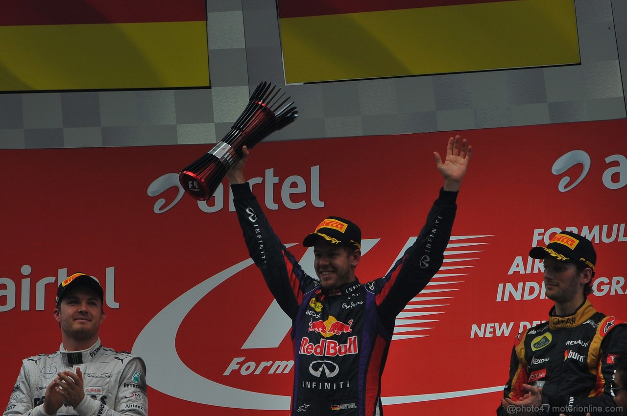 GP INDIA, 27.10.2013- Podium: Sebastian Vettel (GER) Red Bull Racing RB9 (vincitore), Nico Rosberg (GER) Mercedes AMG F1 W04 (secondo) e Romain Grosjean (FRA) Lotus F1 Team E21 (terzo) 